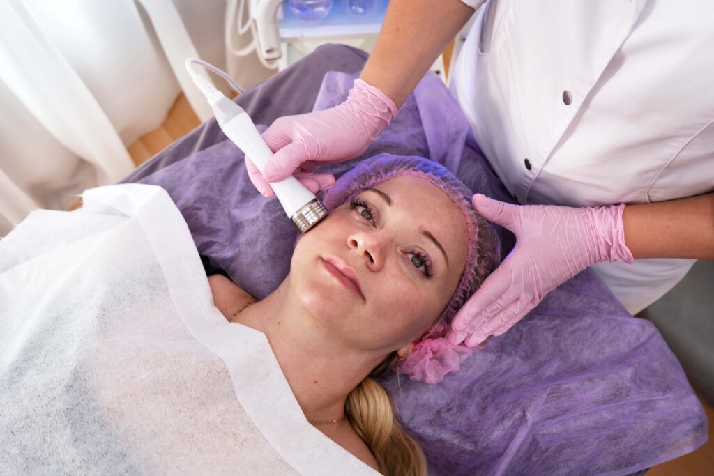 Women getting Coolpeel treatment on face | The Botox Bar and Aesthetics at Dallas & Sherman, TX