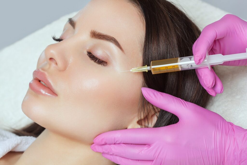 Pretty cute lady getting Injection on her cheeks | Get PRP in The Botox Bar and Aesthetics at Dallas & Sherman, TX